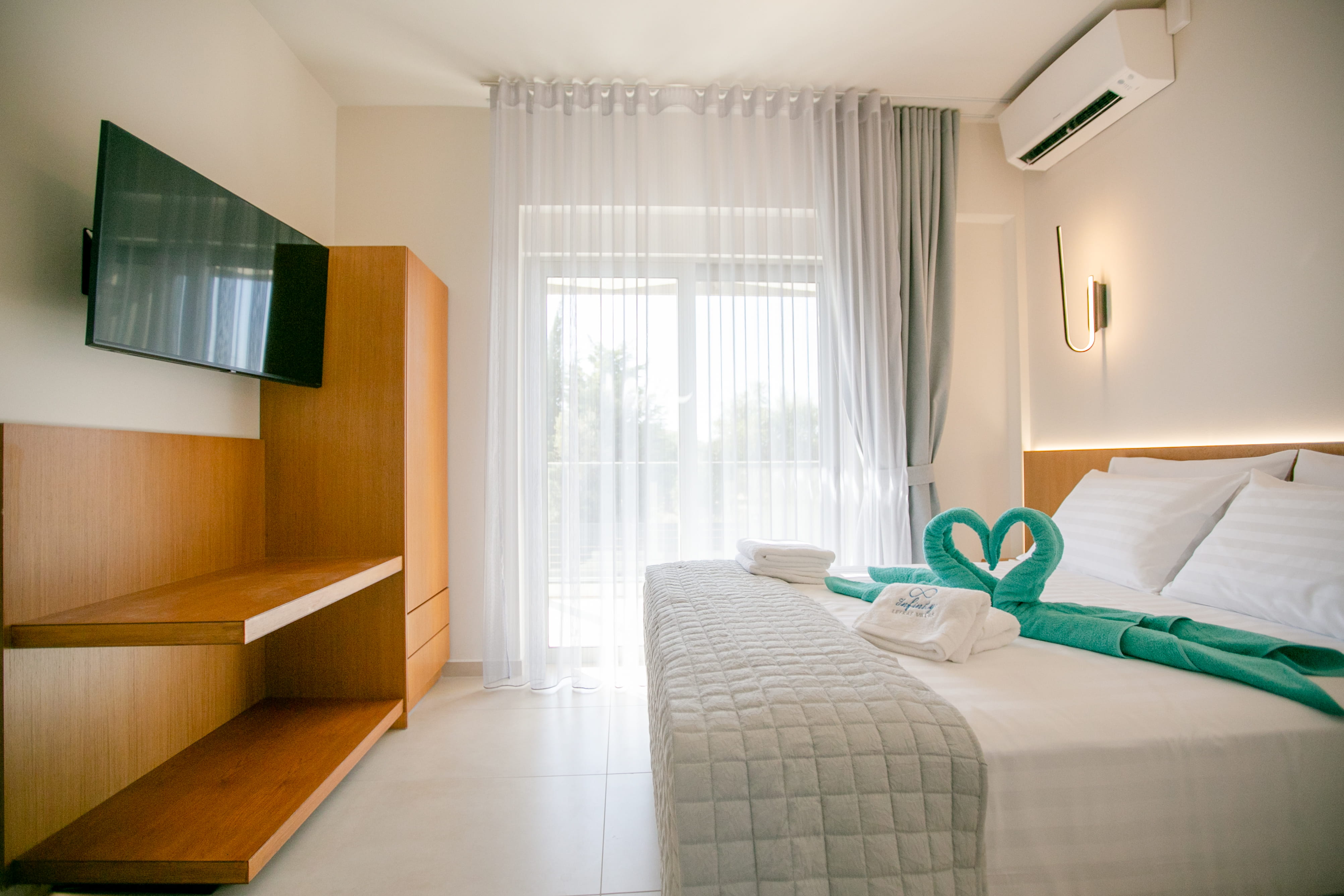 Luxury bedroom with swan towel welcome at 4 bedroom villa Lefkada Greece