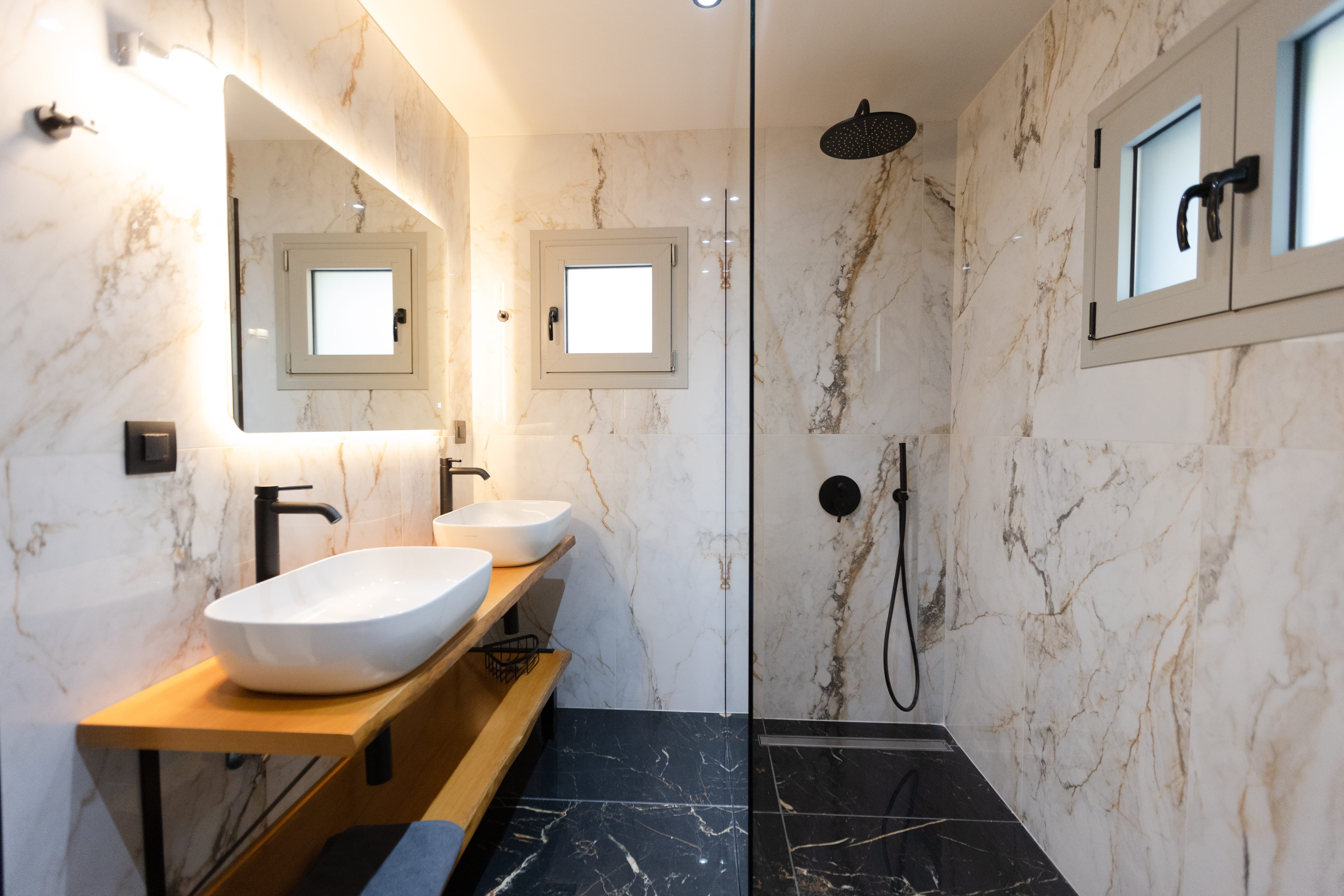 En-suite bathroom looking into bedroom at 3 bedroom Infinity Lefkas villa