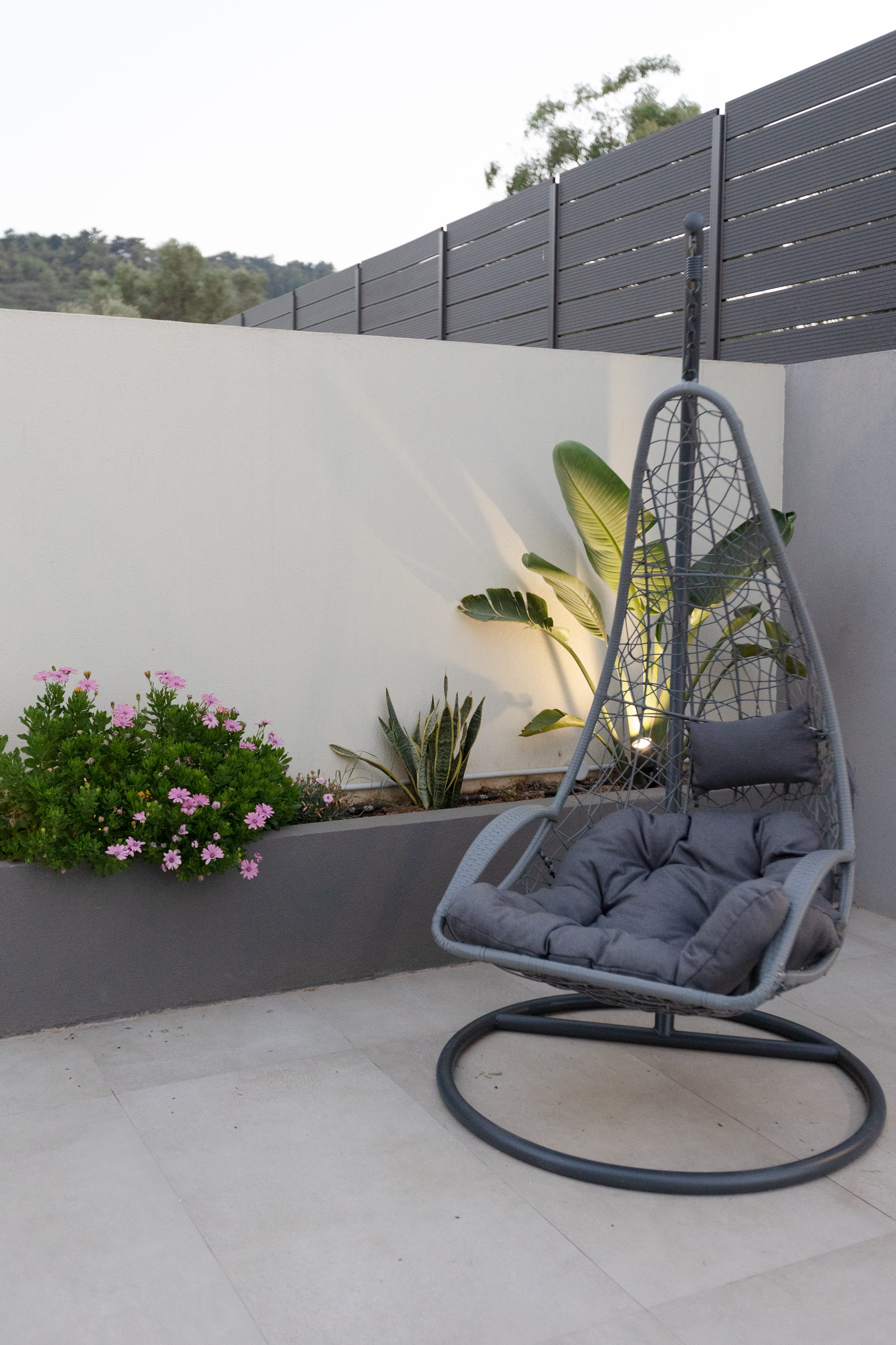 Hanging egg chair in private garden at Infinity Lefkas villa Lefkada