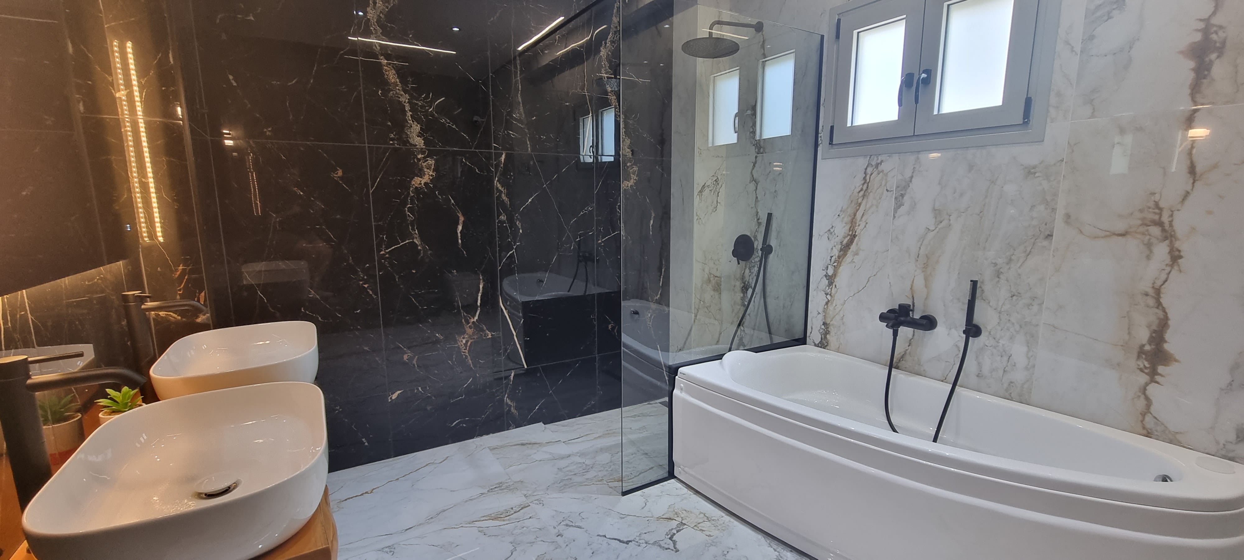 Master en-suite with double sinks and freestanding bath at luxury villa Lefkada